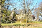 Abandoned yellow brick Ontario farmhouse in Lambton County
