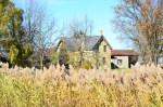 Abandoned yellow brick Ontario farmhouse in Lambton County